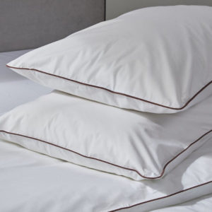 Piping edged luxurious white percale organic cotton pillowcases
